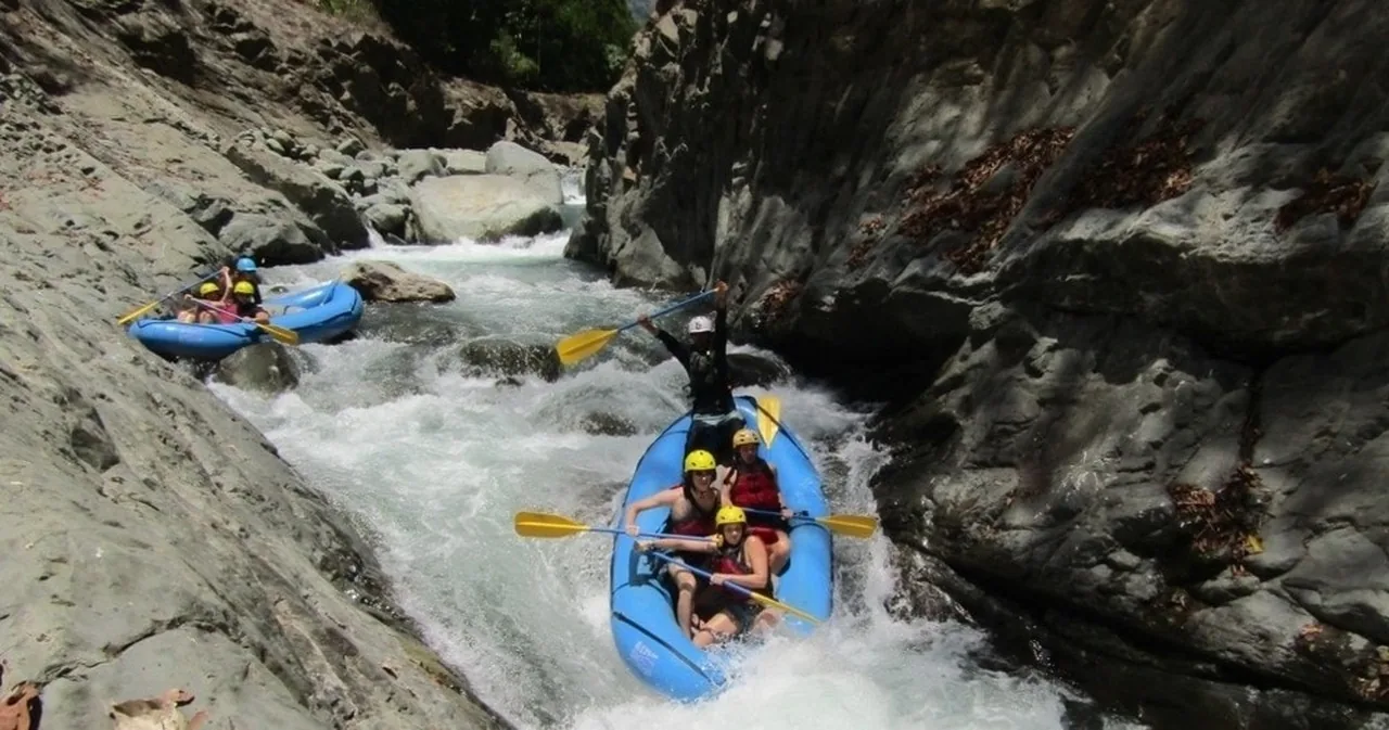 Rafting through whitewater near Playa Dominical, Costa Rica